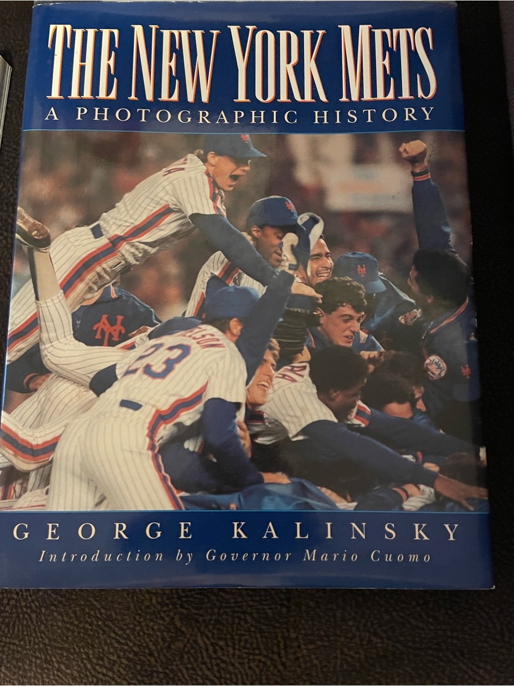 : A Photographic History - Blue Hardcover